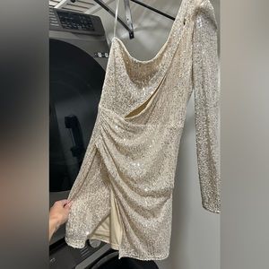 Brand new sparkly dress never worn perfect for new years low cut tight with slit